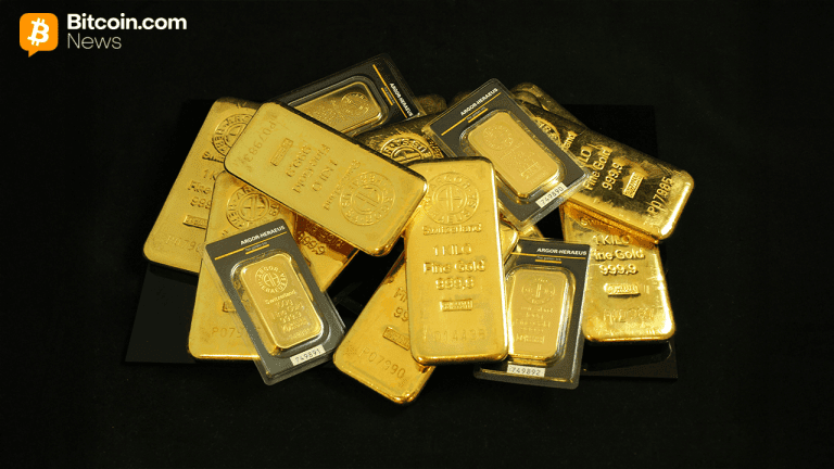 Pile of gold on a black backdrop.