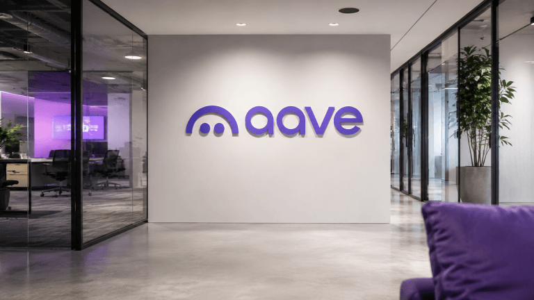 Modern office featuring the defi lending app's logo Aave.