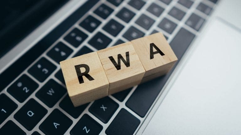 RWA on wooden blocks lying on keyboard