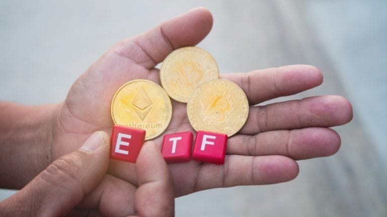 bitcoin and ether coins with ETF dice