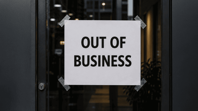 Out of business sign on a door.